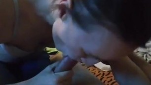 Young stepmom is giving a blowjob