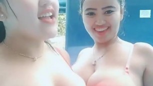 2 girls boobs