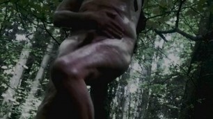 naked bound on a tree and oiled up