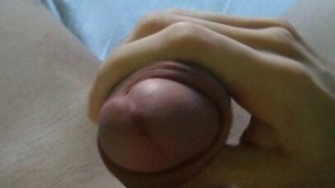 Young man shows off and masturbates his big thick hard pink shaved throbbing cock