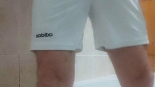 Pissing in my Amsterdam footie jersey and white Adidas shorts