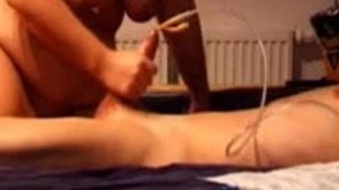 Chubby girl handjob on catherized cock